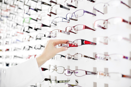 Female optician suggest glasses Tippett Eye Care Center